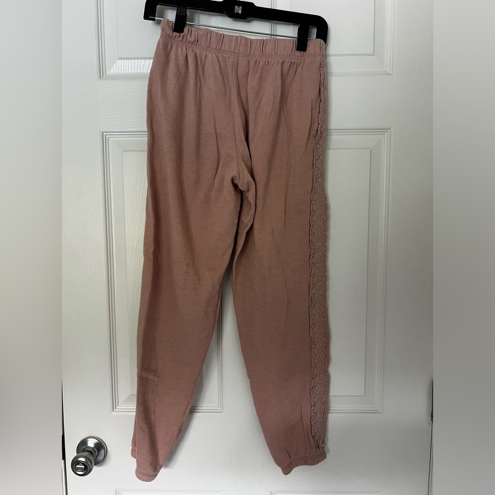 Baby pink joggers with lace side detailing